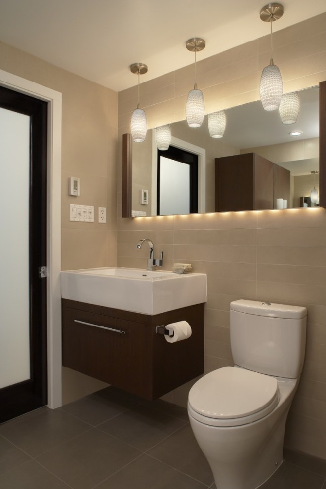 Photo of a contemporary bathroom in Detroit with a wall-mount sink.