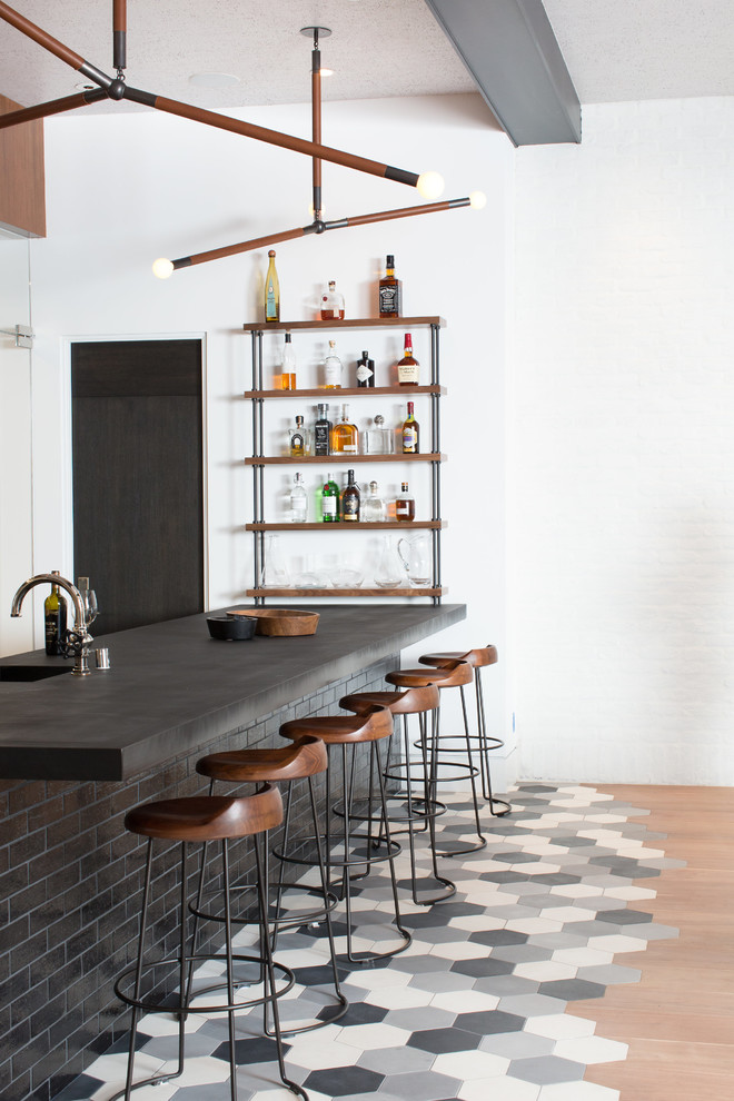 Contemporary seated home bar in Orange County with multi-coloured floor.