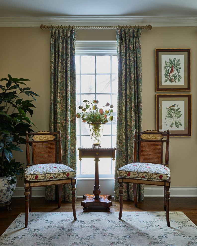 Traditional Rumson Home - A seating vignette is created with the client's own antique side chairs. New seat cushions were fabricated to give the chairs an updated look.  Custom William Morris textile window treatments drape from an ornate pole and finial.
