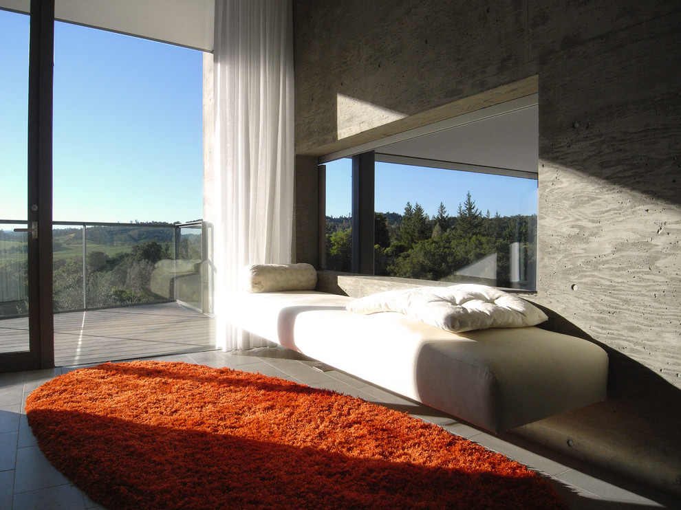 Example of a minimalist bedroom design in San Francisco with gray walls