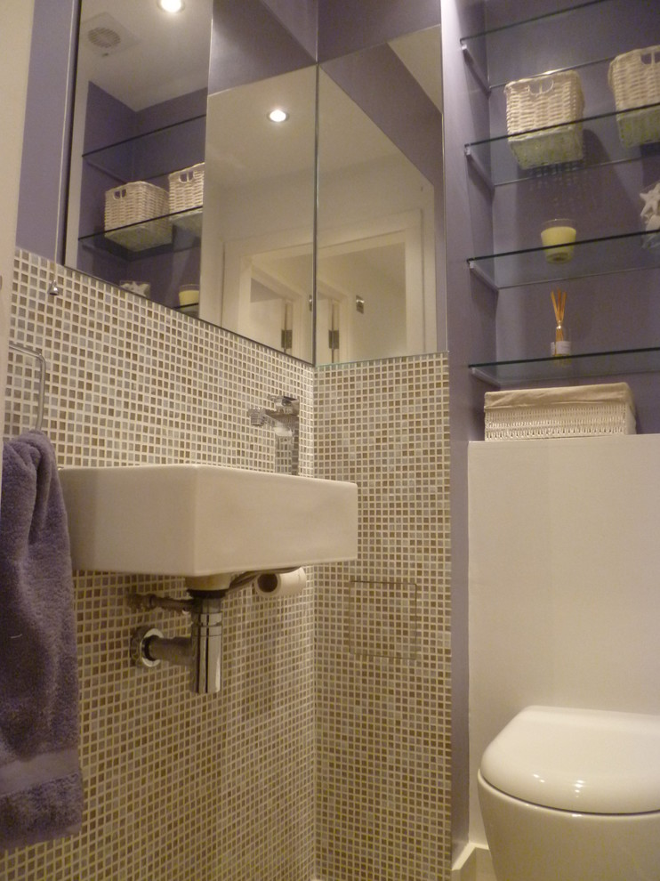 Photo of a contemporary powder room in London.