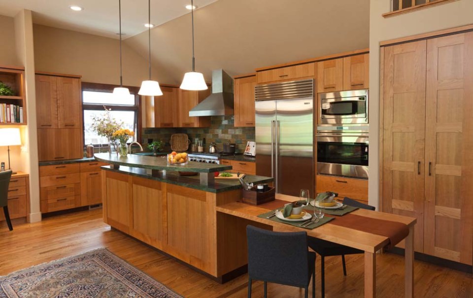 Mid-sized contemporary l-shaped open plan kitchen in San Francisco with a double-bowl sink, shaker cabinets, medium wood cabinets, beige splashback, stainless steel appliances, medium hardwood floors and with island.