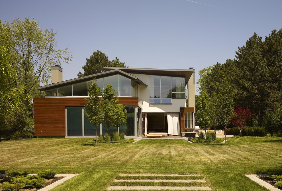 Design ideas for a contemporary exterior in Toronto with wood siding.