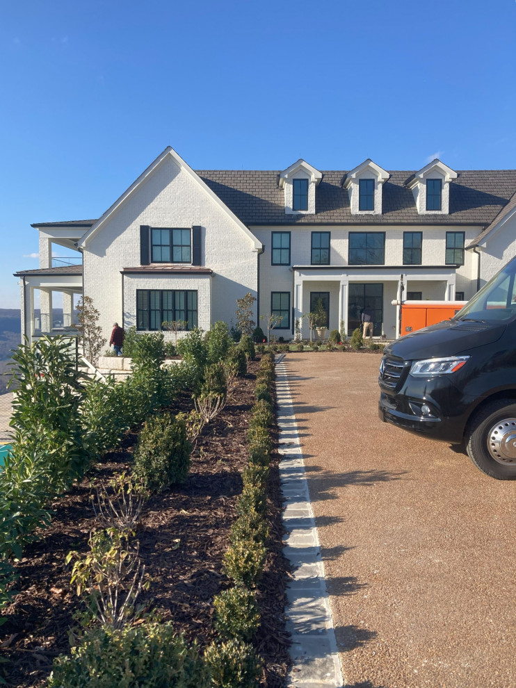 This is an example of a huge traditional full sun backyard flower bed in Atlanta for winter.