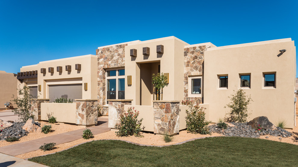 One-storey stucco beige house exterior in Salt Lake City with a flat roof.