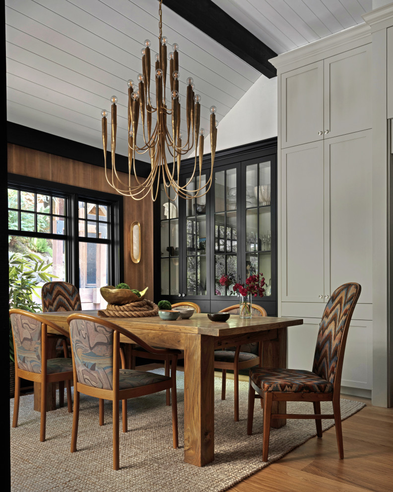 Transitional medium tone wood floor, brown floor, exposed beam, shiplap ceiling, vaulted ceiling and wood wall dining room photo in San Francisco with white walls