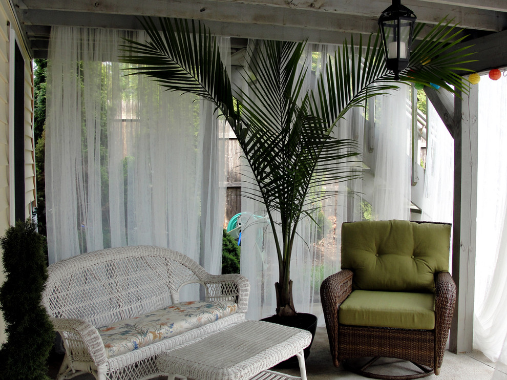 This is an example of a tropical patio in Bridgeport.