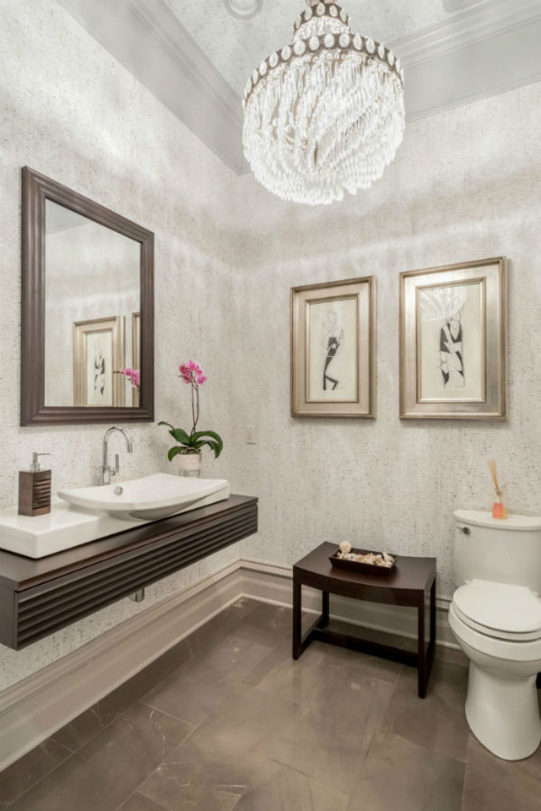 Inspiration for a mid-sized transitional 3/4 bathroom in New York with a one-piece toilet, grey walls, porcelain floors, a vessel sink and wood benchtops.