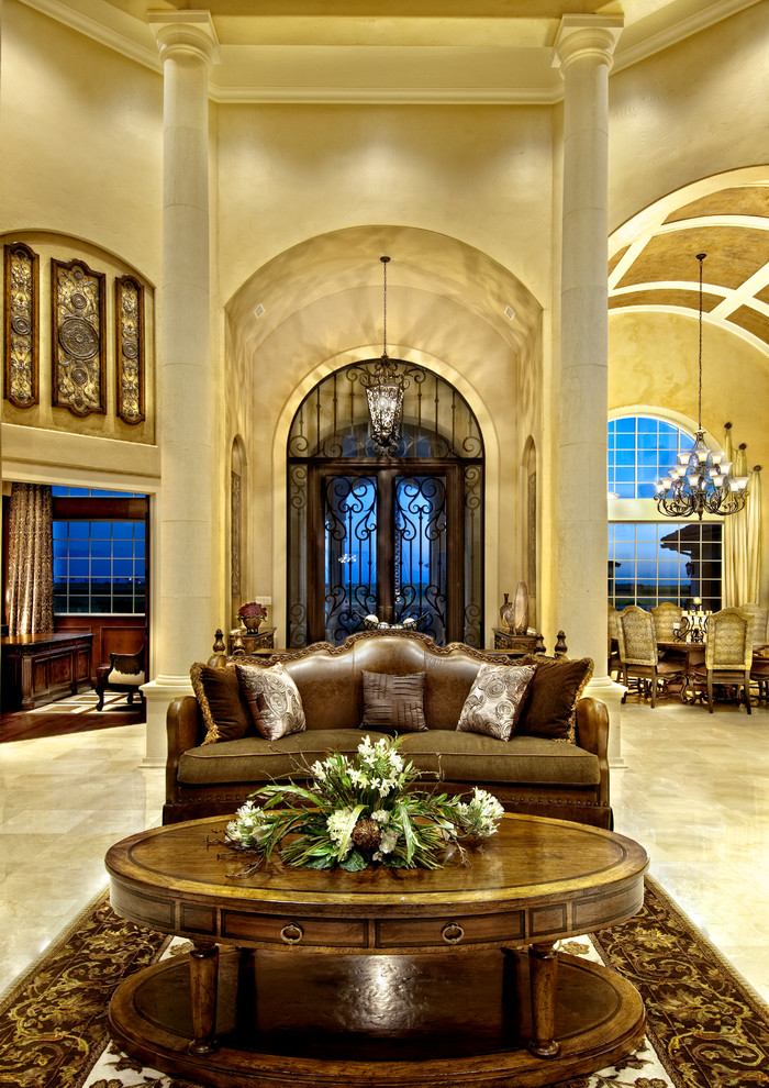 Mediterranean formal open concept living room in Miami with beige walls.