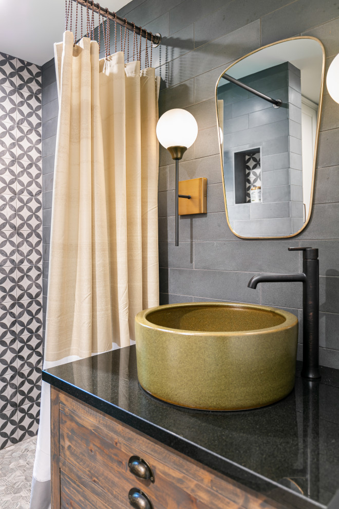 Small contemporary bathroom in Tampa with flat-panel cabinets, distressed cabinets, an alcove shower, a two-piece toilet, black and white tile, slate, porcelain floors, a vessel sink, granite benchtops, a shower curtain, black benchtops, a single vanity and a freestanding vanity.