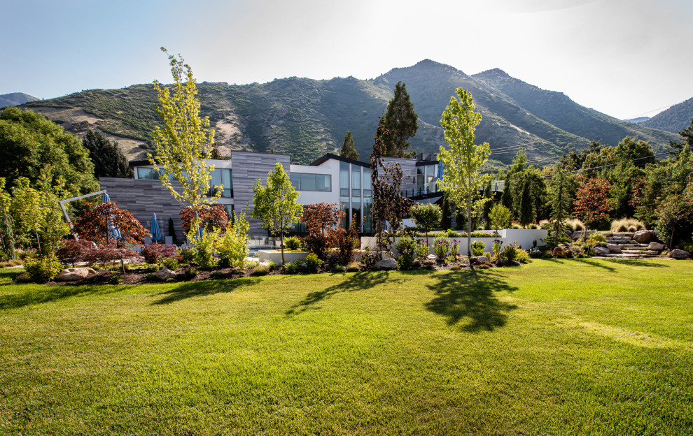 Photo of an expansive contemporary back garden in Salt Lake City.