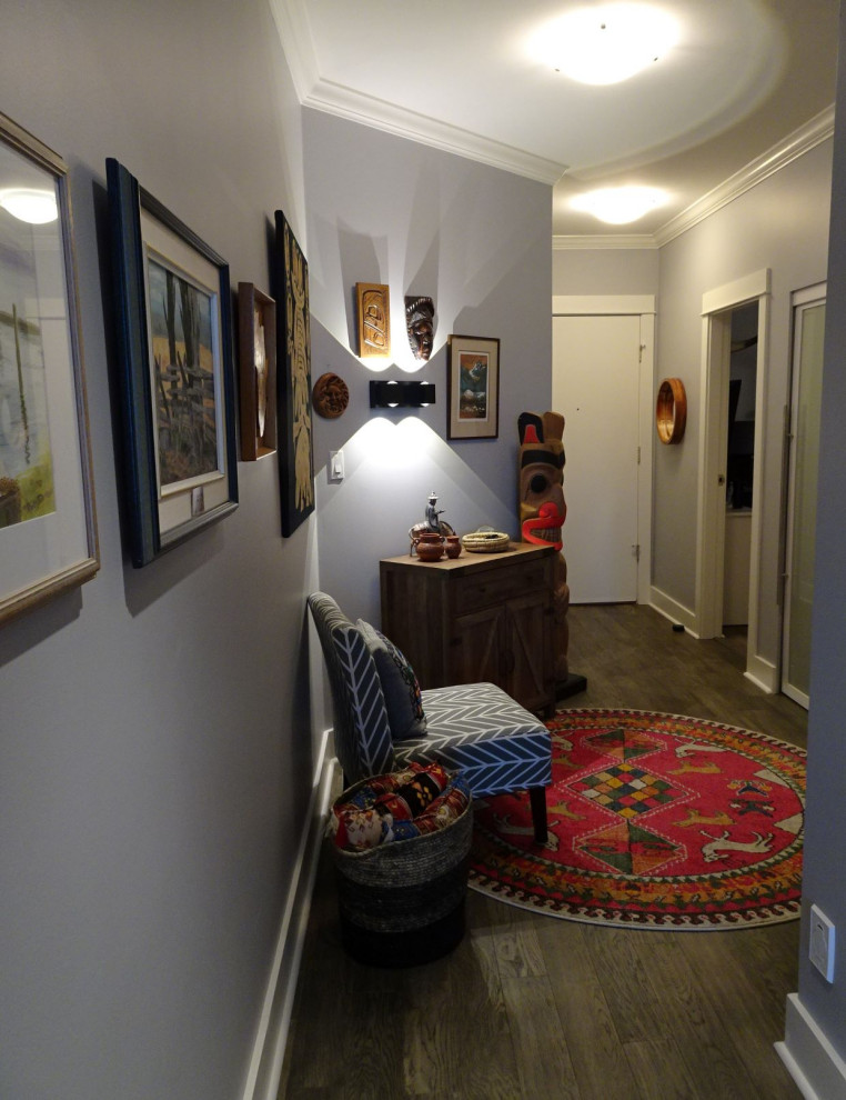 Inspiration for an eclectic vinyl floor and gray floor entryway remodel in Vancouver with gray walls