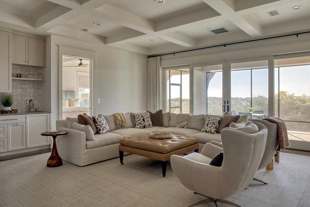 Large beach style open concept medium tone wood floor, brown floor and coffered ceiling family room photo in Other with white walls