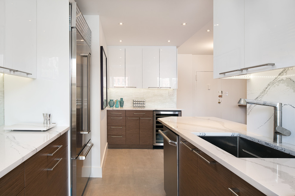 Inspiration for a mid-sized contemporary u-shaped open plan kitchen in New York with an undermount sink, flat-panel cabinets, dark wood cabinets, quartz benchtops, white splashback, stone slab splashback, stainless steel appliances, ceramic floors, multiple islands, grey floor and white benchtop.