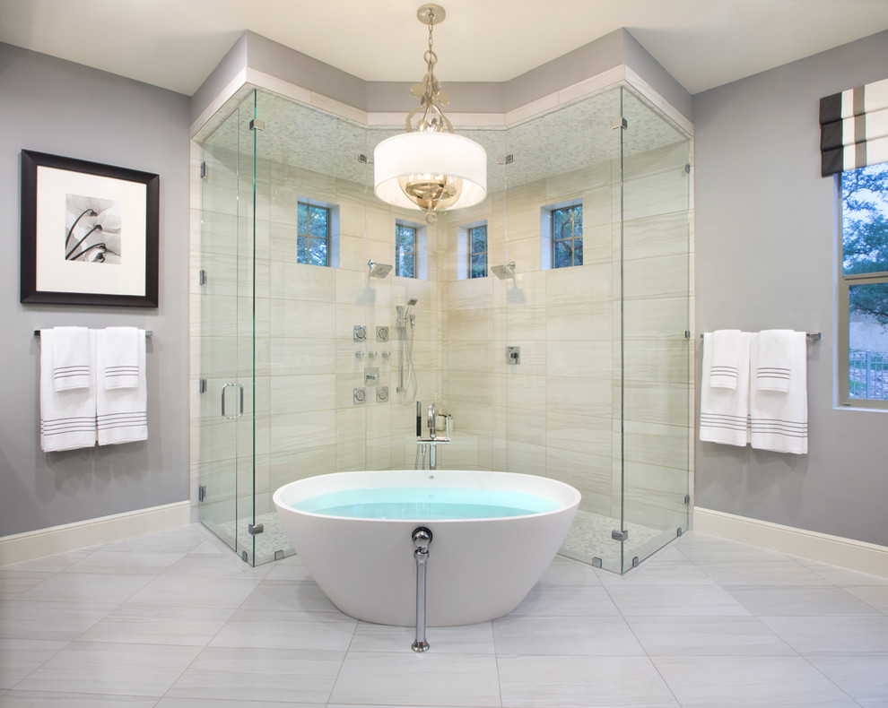 This is an example of a contemporary bathroom in Austin with a corner shower and a freestanding tub.
