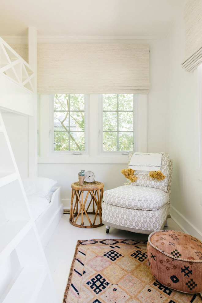 Leo Cottage - Example of a beach style home design design in Denver