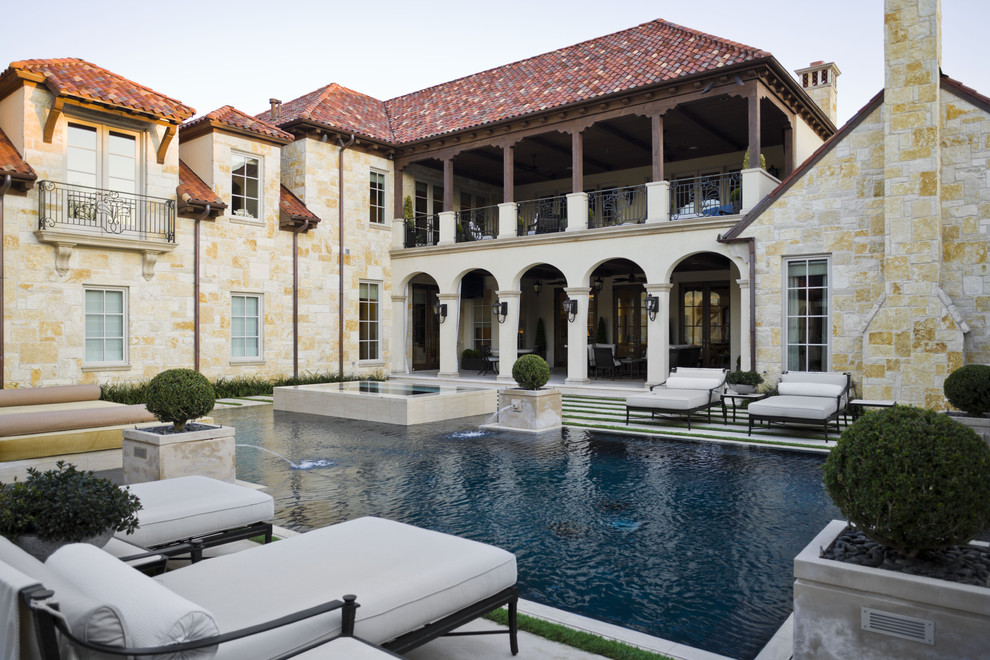 This is an example of a mediterranean rectangular pool in Dallas.