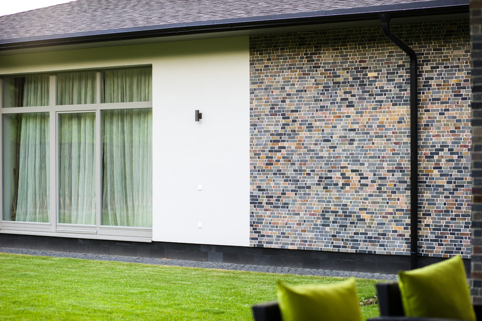 Облицовка фасада мозаикой из натурального камня