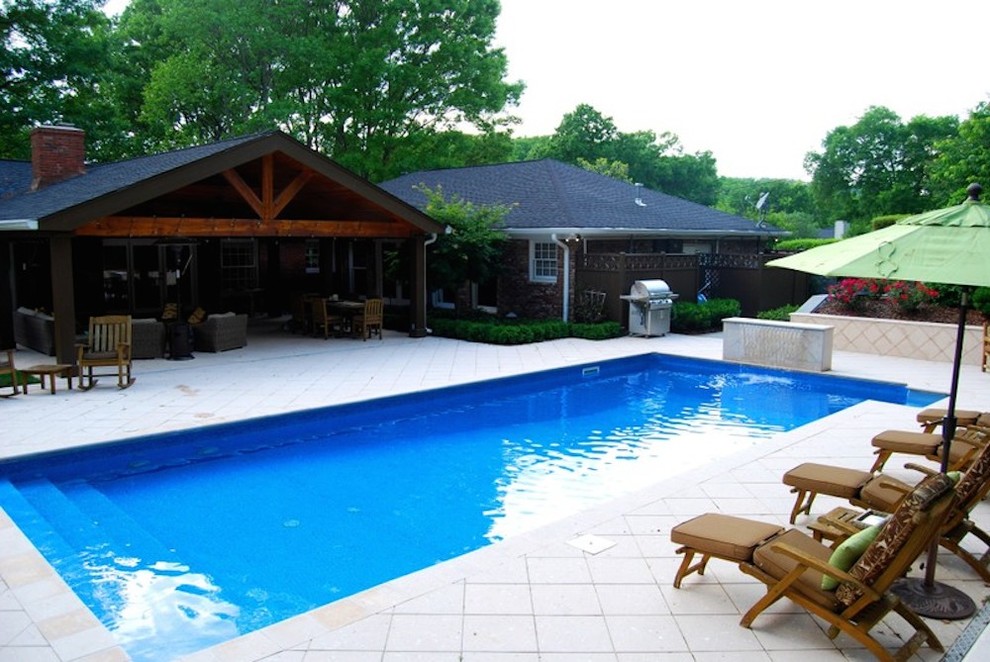 Pool fountain - mid-sized transitional backyard concrete and rectangular pool fountain idea in Nashville