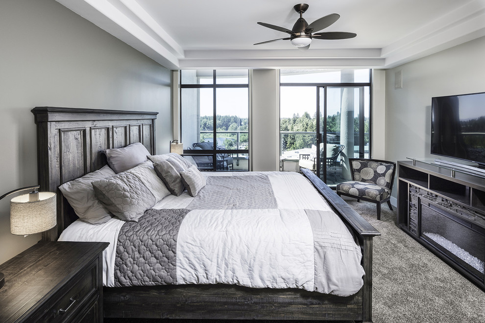Inspiration for a mid-sized contemporary master bedroom in Vancouver with grey walls, carpet and grey floor.