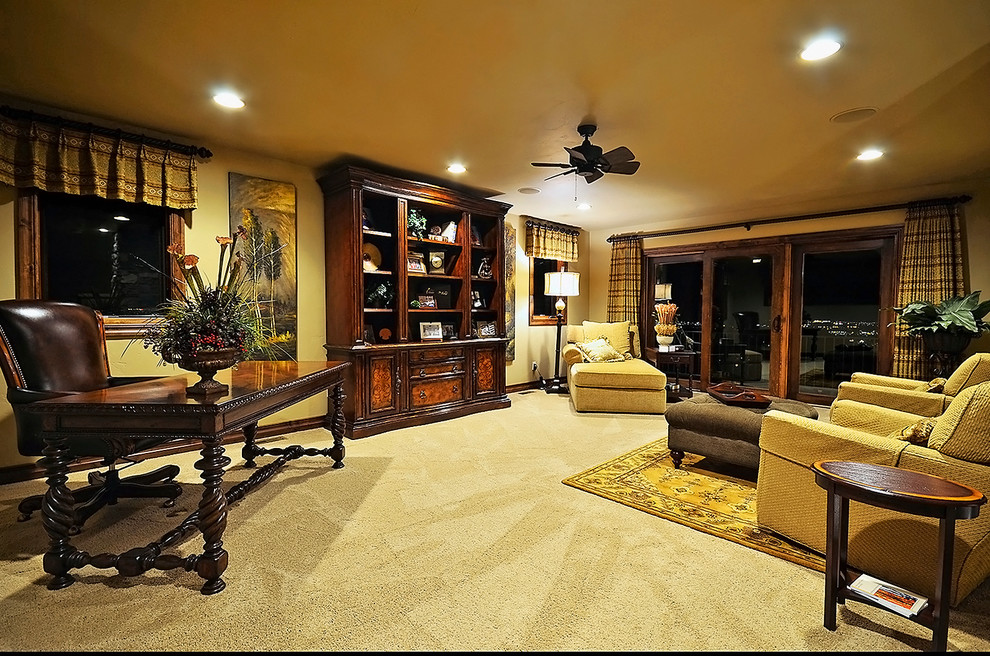 Example of a transitional home design design in Denver