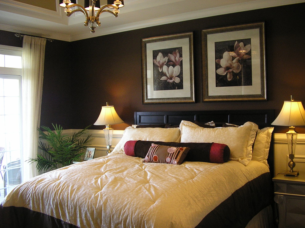 Example of a transitional bedroom design in Chicago