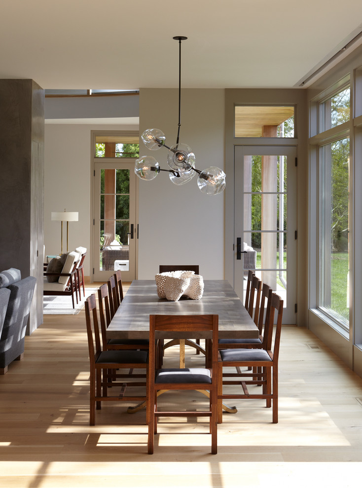 Design ideas for a transitional open plan dining in New York.