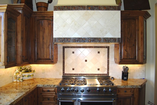 Tuscan Kitchen With Marble Tile Backsplash Distressed Knotty