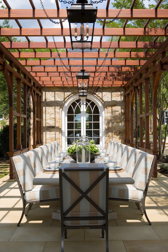 Inspiration for a traditional patio in DC Metro with a pergola.