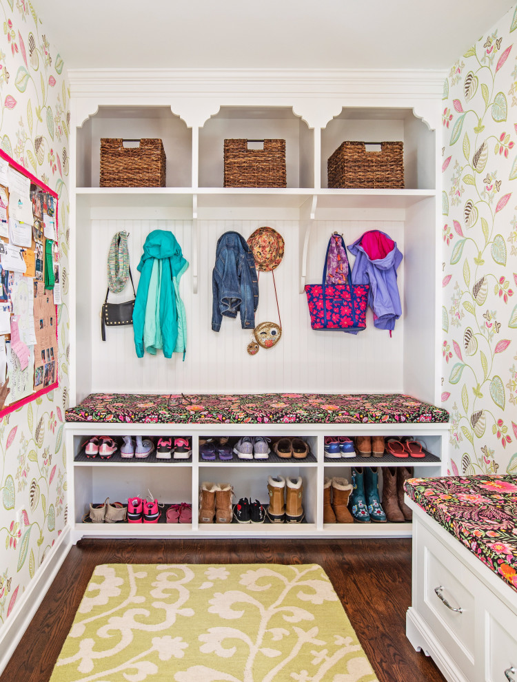 This is an example of a transitional mudroom in Milwaukee with multi-coloured walls, dark hardwood floors, brown floor and wallpaper.