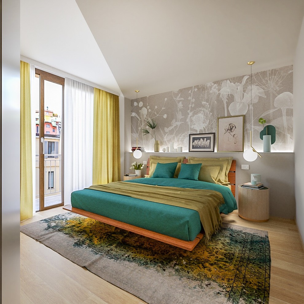 Design ideas for a mid-sized contemporary master bedroom in Milan with beige walls and light hardwood floors.