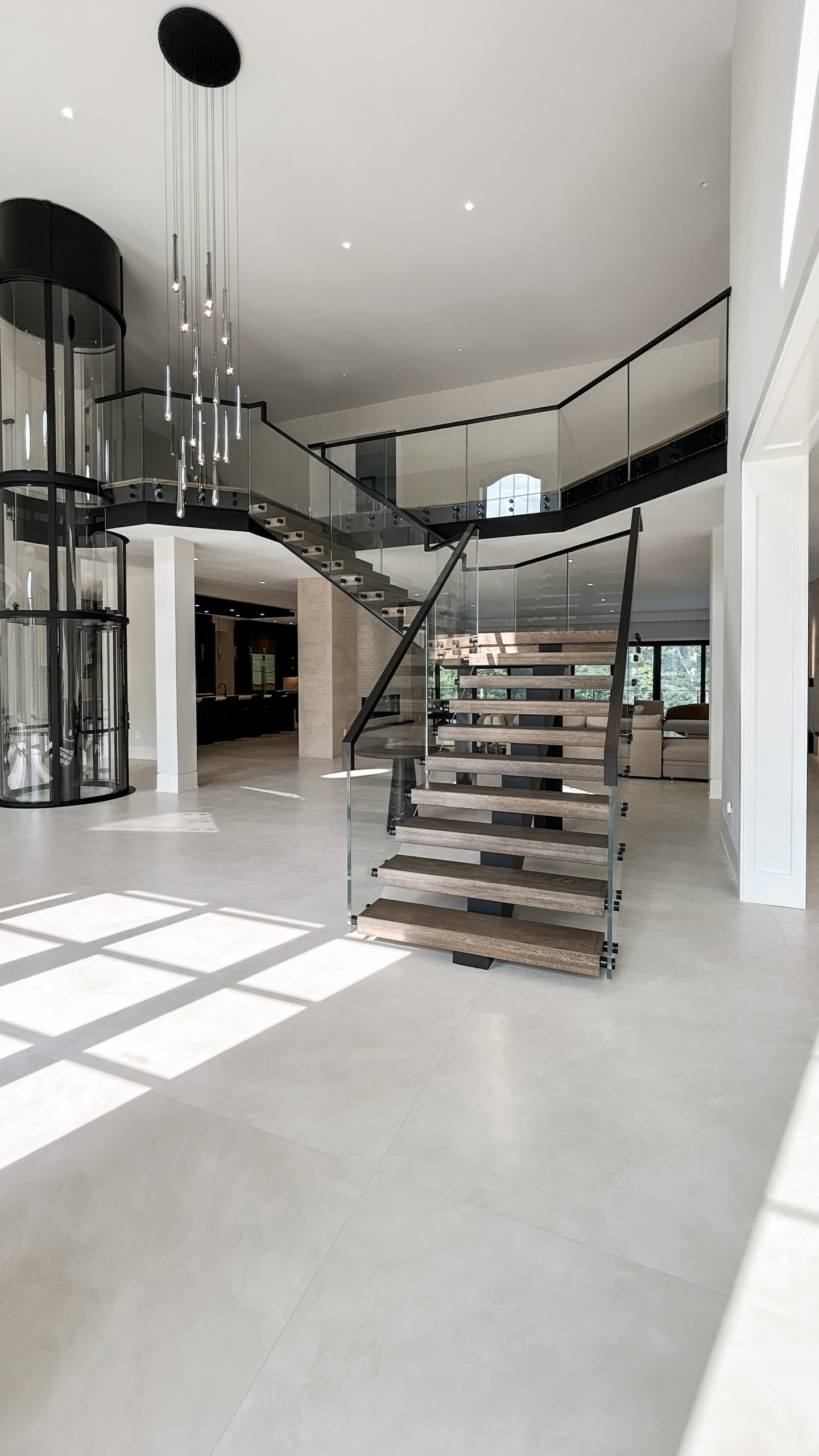 Project #159 | Modern Foyer Stair with Stand-off Glass Railing