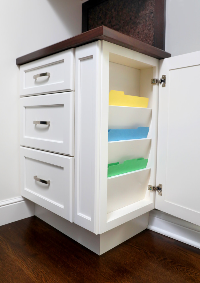 Inspiration for a transitional medium tone wood floor and brown floor eat-in kitchen remodel in Chicago with shaker cabinets and white cabinets