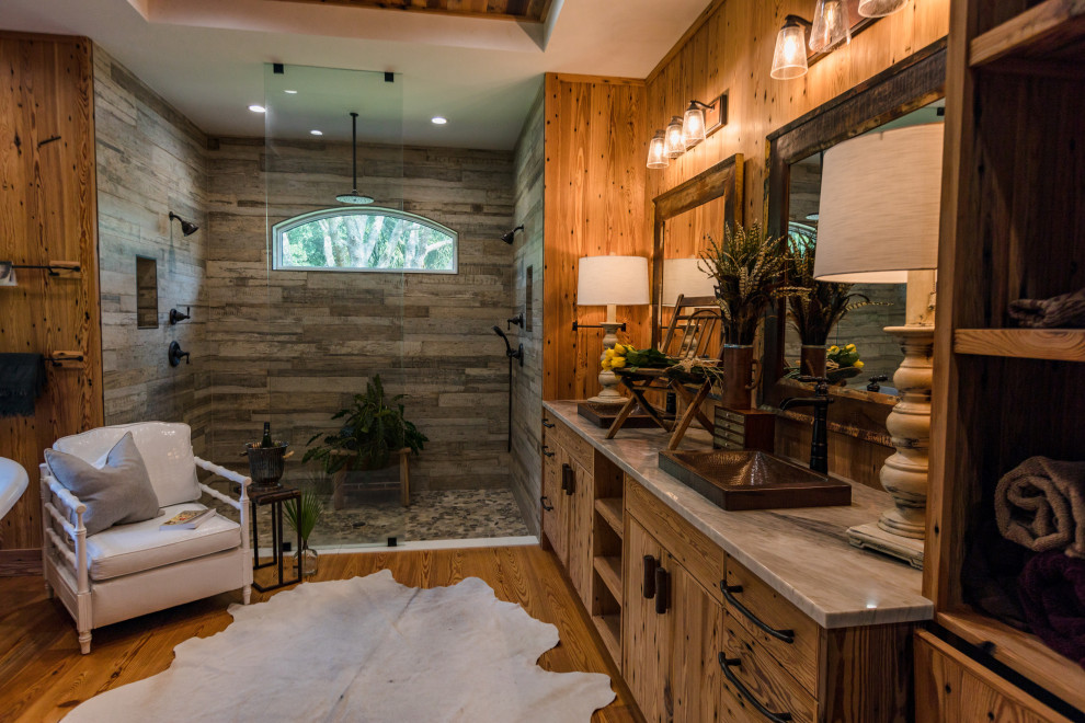 This is an example of a large rustic ensuite bathroom in Miami with a single sink, a wood ceiling and wood walls.