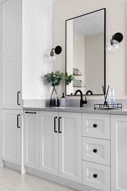 White Shaker Bathroom Vanity With Gray Countertop and Black Hardware