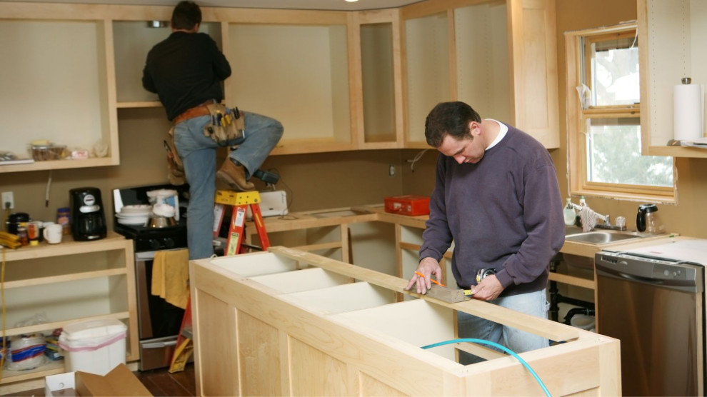 Attempting a DIY kitchen remodel with cabinets and countertops, showing the risks of home renovation projects.