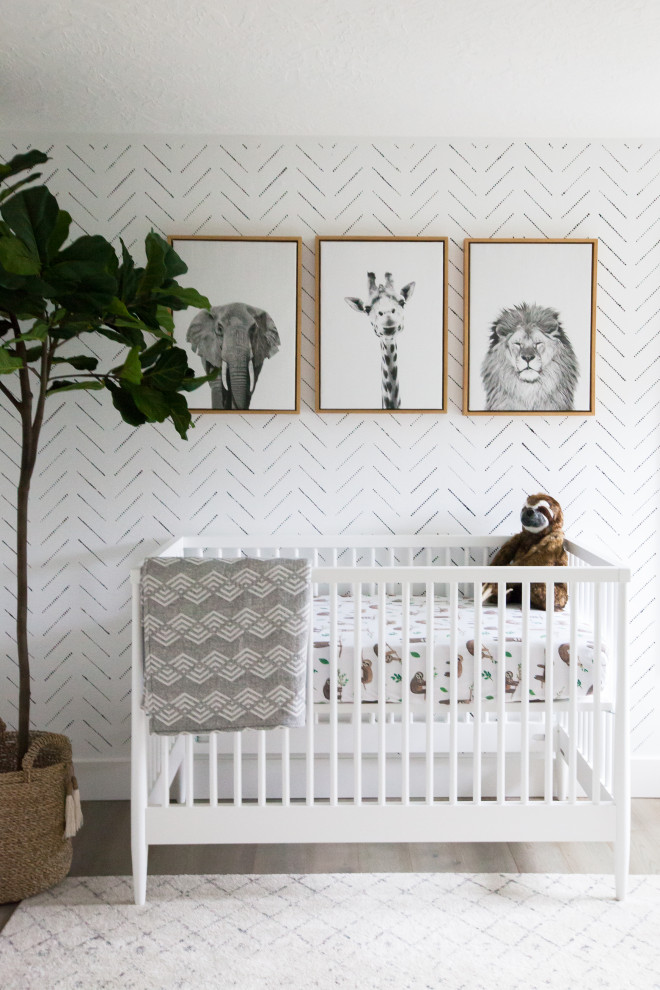 Foto på ett minimalistiskt babyrum