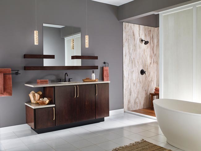 Photo of a large modern master bathroom in New York with flat-panel cabinets, dark wood cabinets, an open shower, a one-piece toilet, white tile, grey walls, ceramic floors, a drop-in sink, soapstone benchtops, white floor and an open shower.
