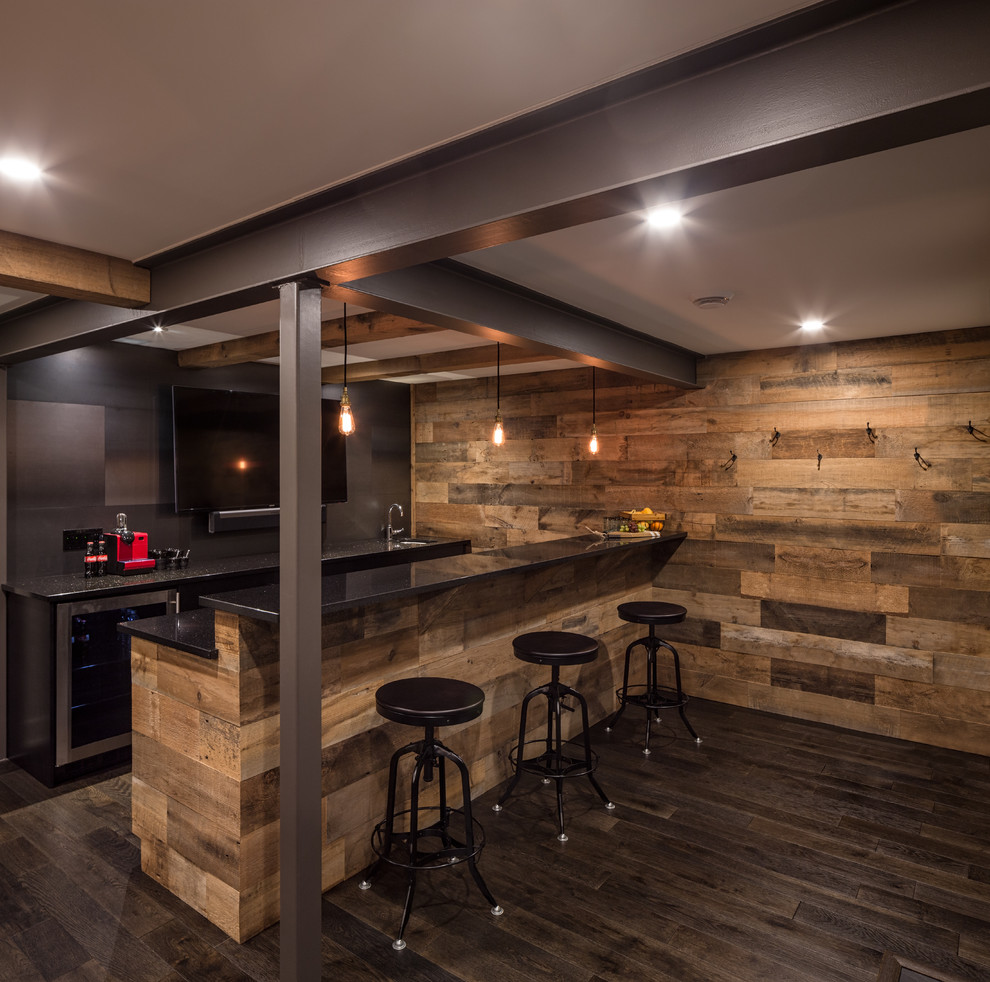 Country galley seated home bar in Ottawa with dark hardwood floors and an undermount sink.