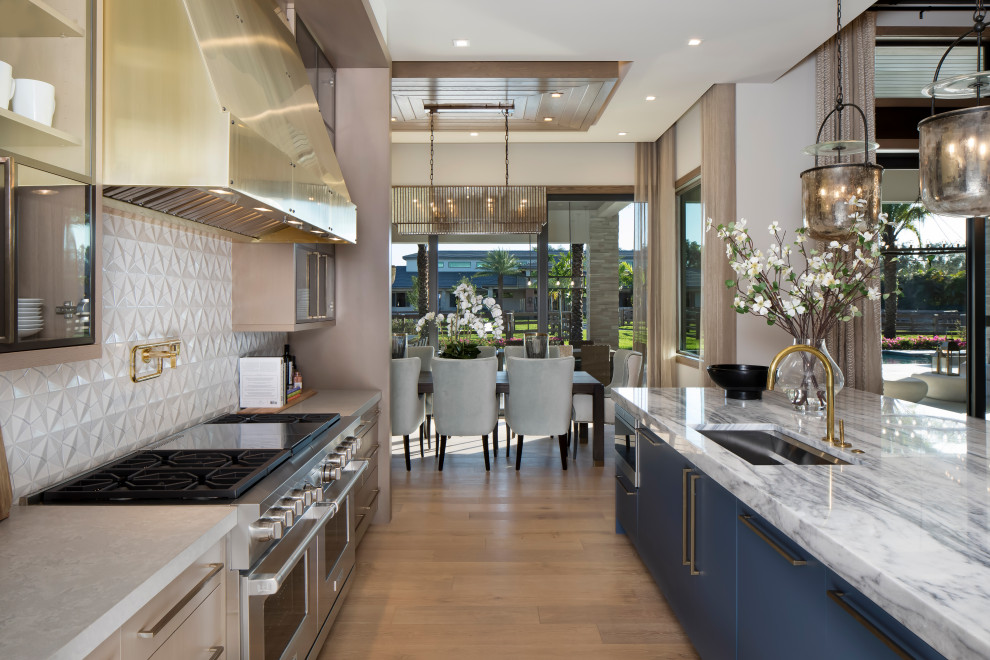 Photo of a large transitional galley kitchen in Miami.