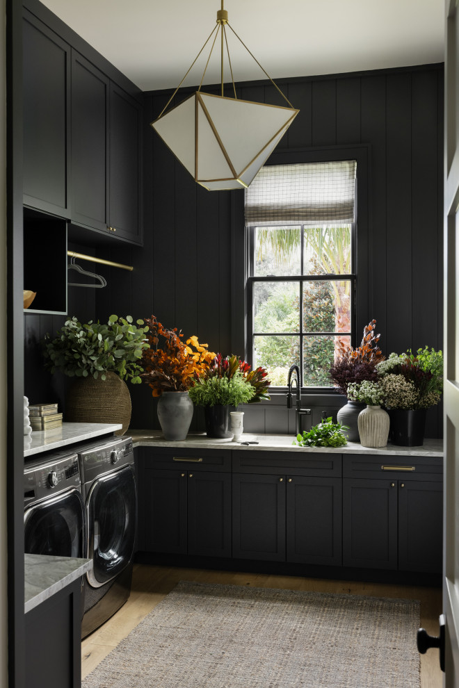 Inspiration for a transitional laundry room remodel in Orlando