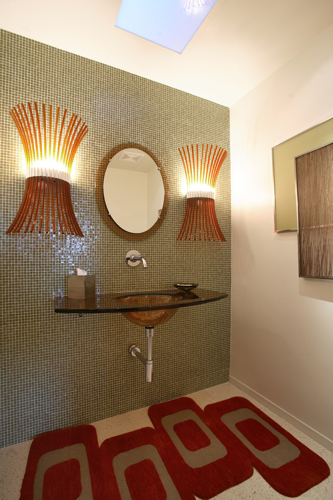 Photo of a contemporary powder room in Los Angeles with an integrated sink.