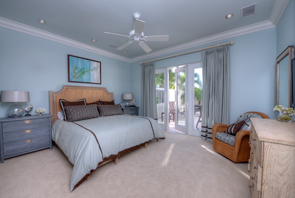 Inspiration for a transitional bedroom in Tampa with blue walls.