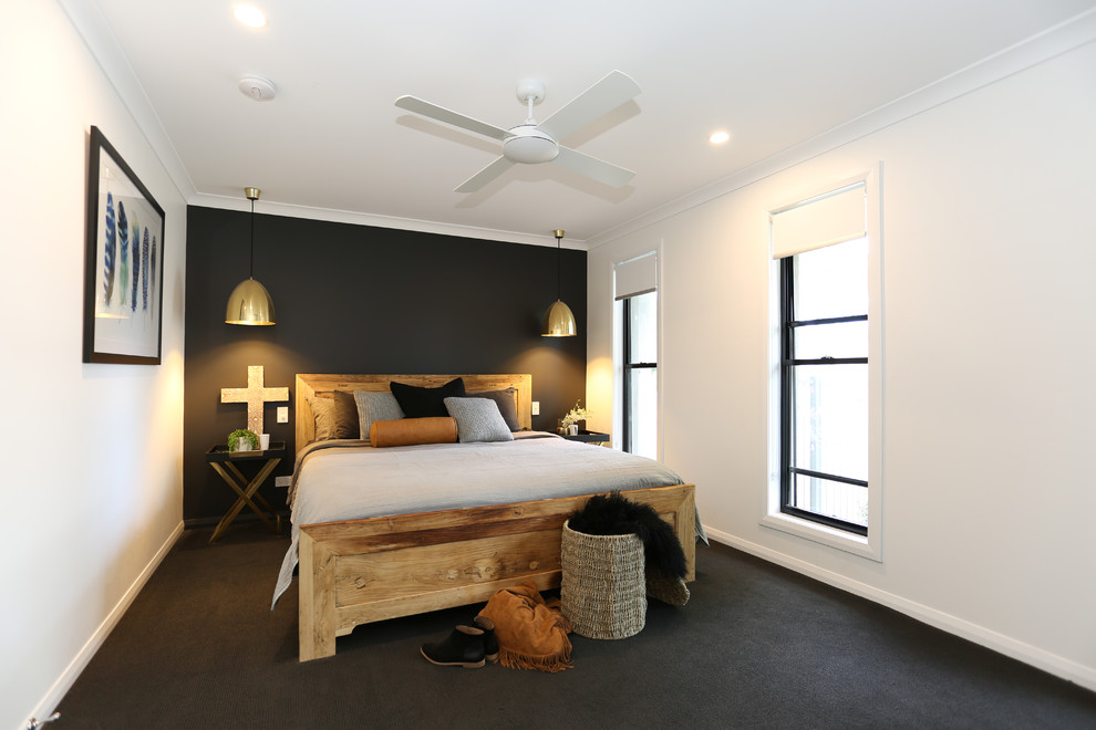 Design ideas for a mid-sized eclectic master bedroom with black walls, carpet and black floor.