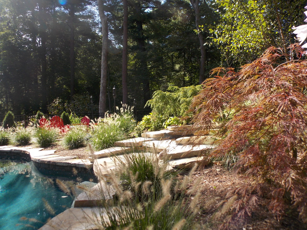 Example of a transitional home design design in Boston