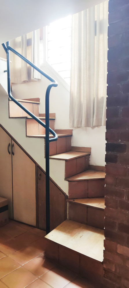 This is an example of a shabby-chic style staircase in Bengaluru.