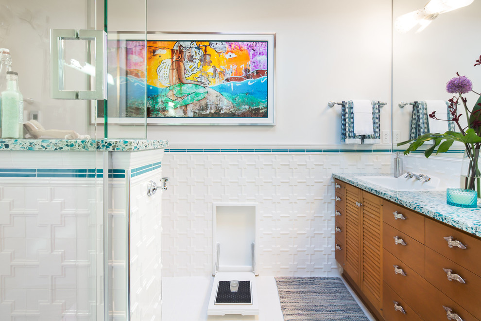 Inspiration for a large midcentury 3/4 bathroom in Seattle with flat-panel cabinets, dark wood cabinets, a corner shower, white tile, porcelain tile, white walls, porcelain floors, a drop-in sink, recycled glass benchtops, white floor and a hinged shower door.