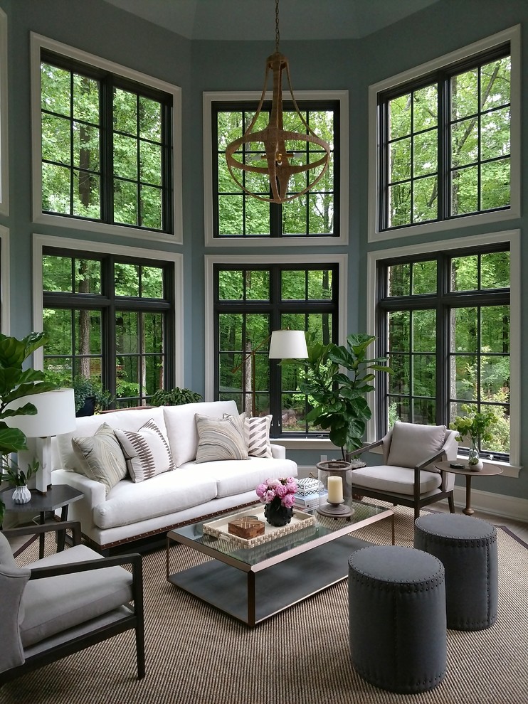Design ideas for a transitional sunroom in Baltimore with a standard ceiling and grey floor.