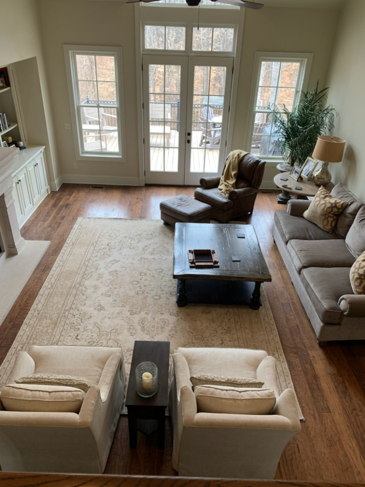 Photo of a transitional open concept living room in Birmingham.