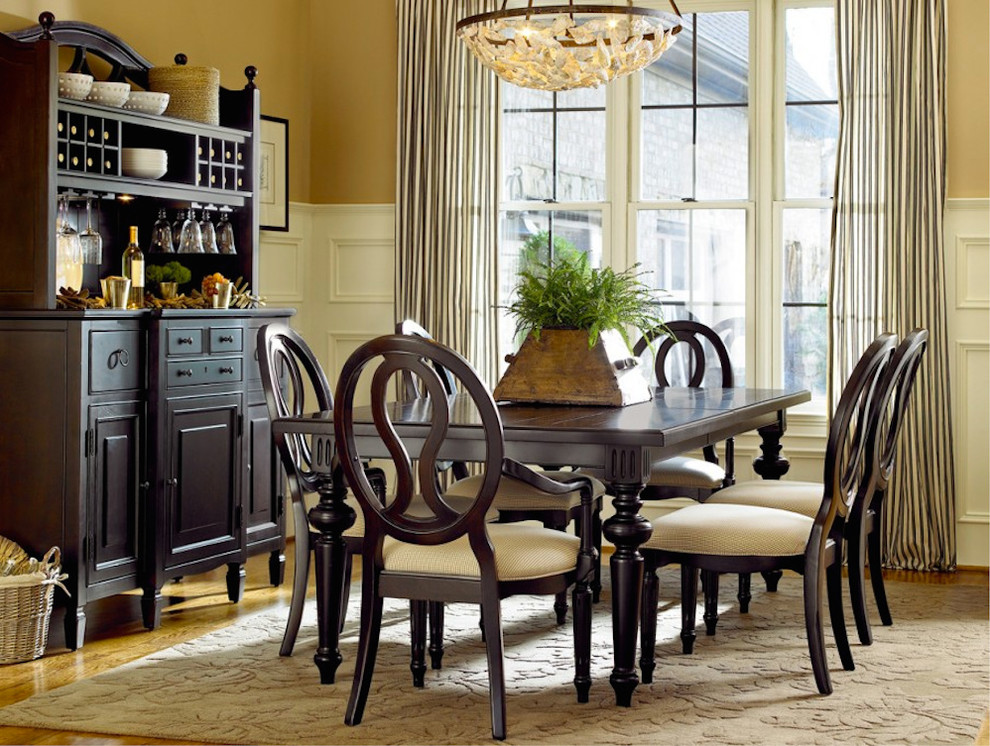 Inspiration for a large medium tone wood floor great room remodel with beige walls